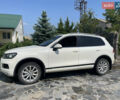 Белый Фольксваген Туарег, объемом двигателя 3 л и пробегом 220 тыс. км за 17000 $, фото 1 на Automoto.ua