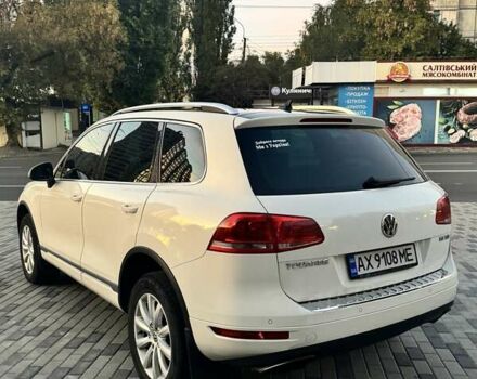 Білий Фольксваген Туарег, об'ємом двигуна 4.13 л та пробігом 195 тис. км за 26500 $, фото 11 на Automoto.ua
