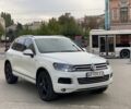 Білий Фольксваген Туарег, об'ємом двигуна 3 л та пробігом 235 тис. км за 14800 $, фото 1 на Automoto.ua