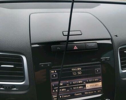 Белый Фольксваген Туарег, объемом двигателя 3 л и пробегом 208 тыс. км за 16000 $, фото 1 на Automoto.ua