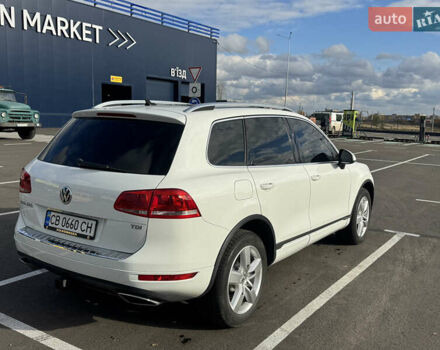 Белый Фольксваген Туарег, объемом двигателя 3 л и пробегом 175 тыс. км за 17500 $, фото 1 на Automoto.ua