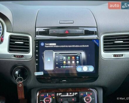 Білий Фольксваген Туарег, об'ємом двигуна 3 л та пробігом 239 тис. км за 19300 $, фото 43 на Automoto.ua