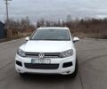 Белый Фольксваген Туарег, объемом двигателя 2.97 л и пробегом 290 тыс. км за 18000 $, фото 1 на Automoto.ua