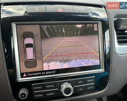 Белый Фольксваген Туарег, объемом двигателя 3 л и пробегом 260 тыс. км за 18900 $, фото 22 на Automoto.ua