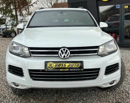 Белый Фольксваген Туарег, объемом двигателя 3 л и пробегом 214 тыс. км за 18999 $, фото 1 на Automoto.ua