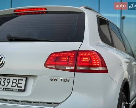 Білий Фольксваген Туарег, об'ємом двигуна 3 л та пробігом 239 тис. км за 19300 $, фото 17 на Automoto.ua