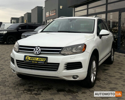 Білий Фольксваген Туарег, об'ємом двигуна 3 л та пробігом 283 тис. км за 20800 $, фото 2 на Automoto.ua