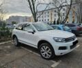 Белый Фольксваген Туарег, объемом двигателя 3 л и пробегом 154 тыс. км за 12500 $, фото 1 на Automoto.ua