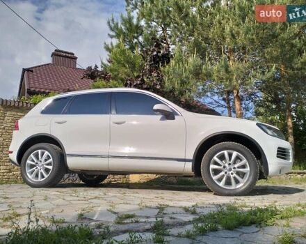 Білий Фольксваген Туарег, об'ємом двигуна 3 л та пробігом 241 тис. км за 21800 $, фото 33 на Automoto.ua