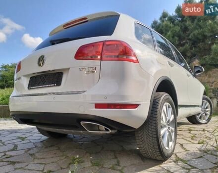 Білий Фольксваген Туарег, об'ємом двигуна 3 л та пробігом 241 тис. км за 21800 $, фото 1 на Automoto.ua