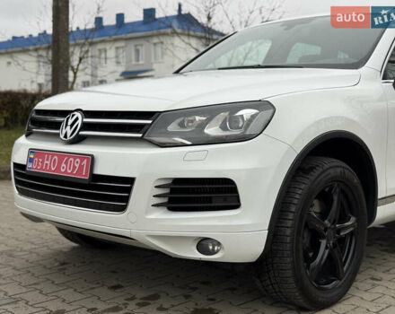 Белый Фольксваген Туарег, объемом двигателя 3 л и пробегом 279 тыс. км за 22999 $, фото 1 на Automoto.ua