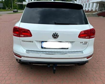 Белый Фольксваген Туарег, объемом двигателя 3 л и пробегом 172 тыс. км за 32500 $, фото 1 на Automoto.ua