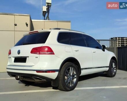 Білий Фольксваген Туарег, об'ємом двигуна 3 л та пробігом 157 тис. км за 27500 $, фото 1 на Automoto.ua