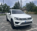 Білий Фольксваген Туарег, об'ємом двигуна 2.97 л та пробігом 247 тис. км за 29800 $, фото 1 на Automoto.ua