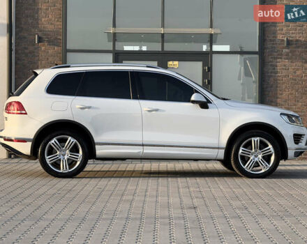 Білий Фольксваген Туарег, об'ємом двигуна 3 л та пробігом 279 тис. км за 24700 $, фото 1 на Automoto.ua