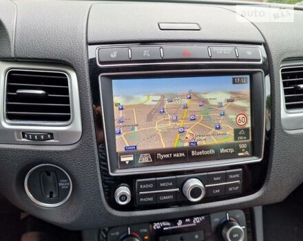 Білий Фольксваген Туарег, об'ємом двигуна 3 л та пробігом 102 тис. км за 34800 $, фото 12 на Automoto.ua