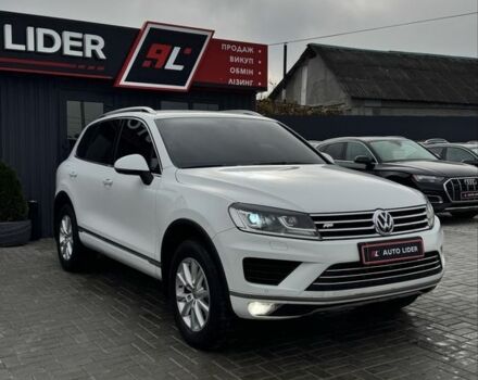 Белый Фольксваген Туарег, объемом двигателя 3 л и пробегом 320 тыс. км за 23700 $, фото 1 на Automoto.ua