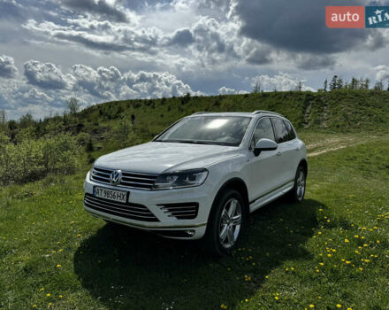 Белый Фольксваген Туарег, объемом двигателя 3 л и пробегом 196 тыс. км за 35000 $, фото 1 на Automoto.ua
