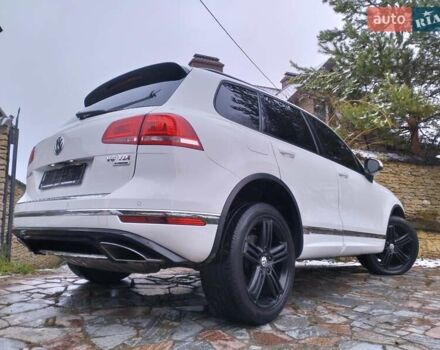 Белый Фольксваген Туарег, объемом двигателя 3 л и пробегом 183 тыс. км за 28700 $, фото 1 на Automoto.ua