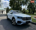 Білий Фольксваген Туарег, об'ємом двигуна 3 л та пробігом 213 тис. км за 39300 $, фото 1 на Automoto.ua