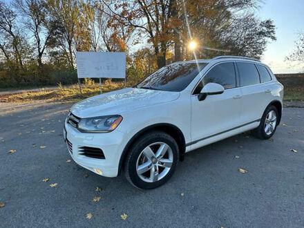 Белый Фольксваген Туарег, объемом двигателя 2.97 л и пробегом 269 тыс. км за 18500 $, фото 1 на Automoto.ua