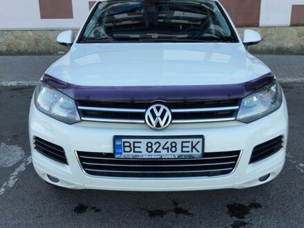 Белый Фольксваген Туарег, объемом двигателя 3 л и пробегом 425 тыс. км за 14000 $, фото 1 на Automoto.ua