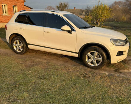 Белый Фольксваген Туарег, объемом двигателя 2.97 л и пробегом 230 тыс. км за 16800 $, фото 1 на Automoto.ua