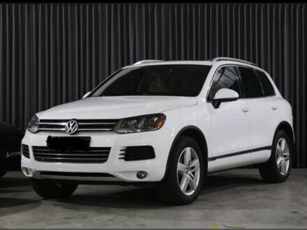 Белый Фольксваген Туарег, объемом двигателя 3 л и пробегом 286 тыс. км за 16900 $, фото 1 на Automoto.ua