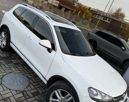 Білий Фольксваген Туарег, об'ємом двигуна 2.97 л та пробігом 265 тис. км за 17500 $, фото 1 на Automoto.ua