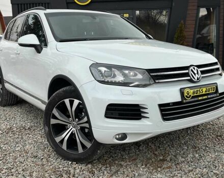 Белый Фольксваген Туарег, объемом двигателя 3 л и пробегом 214 тыс. км за 18999 $, фото 1 на Automoto.ua