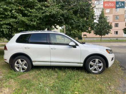Белый Фольксваген Туарег, объемом двигателя 3.6 л и пробегом 205 тыс. км за 14700 $, фото 1 на Automoto.ua