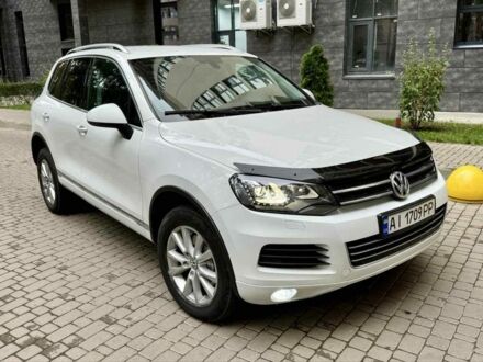 Белый Фольксваген Туарег, объемом двигателя 3 л и пробегом 291 тыс. км за 15900 $, фото 1 на Automoto.ua