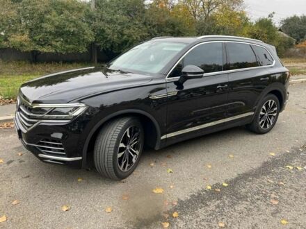 Белый Фольксваген Туарег, объемом двигателя 3 л и пробегом 125 тыс. км за 47500 $, фото 1 на Automoto.ua