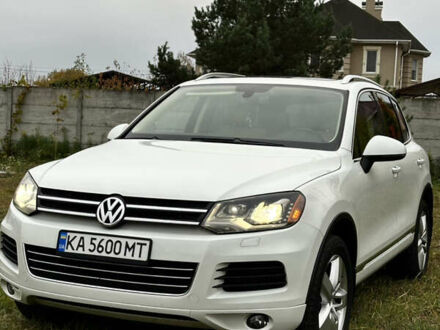 Белый Фольксваген Туарег, объемом двигателя 3 л и пробегом 236 тыс. км за 22000 $, фото 1 на Automoto.ua