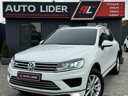 Белый Фольксваген Туарег, объемом двигателя 3 л и пробегом 320 тыс. км за 23700 $, фото 1 на Automoto.ua