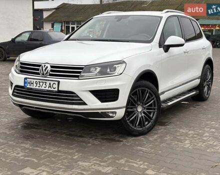 Белый Фольксваген Туарег, объемом двигателя 3 л и пробегом 269 тыс. км за 27000 $, фото 1 на Automoto.ua