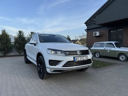 Белый Фольксваген Туарег, объемом двигателя 3 л и пробегом 219 тыс. км за 31700 $, фото 1 на Automoto.ua