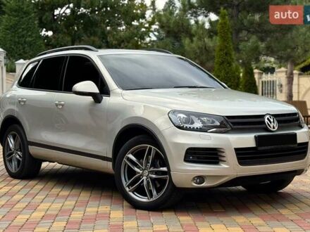 Бежевий Фольксваген Туарег, об'ємом двигуна 3 л та пробігом 180 тис. км за 16000 $, фото 1 на Automoto.ua