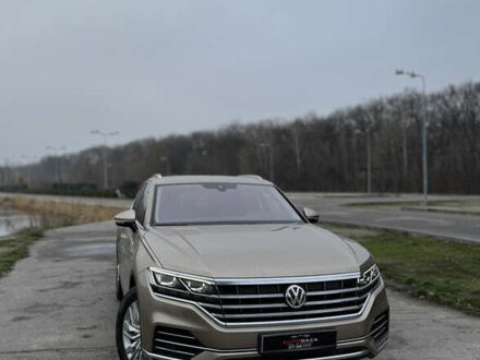 Бежевий Фольксваген Туарег, об'ємом двигуна 3 л та пробігом 124 тис. км за 43900 $, фото 1 на Automoto.ua