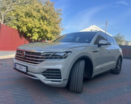 Бежевый Фольксваген Туарег, объемом двигателя 3 л и пробегом 127 тыс. км за 52500 $, фото 1 на Automoto.ua