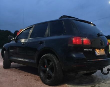 Черный Фольксваген Туарег, объемом двигателя 3 л и пробегом 318 тыс. км за 5800 $, фото 1 на Automoto.ua