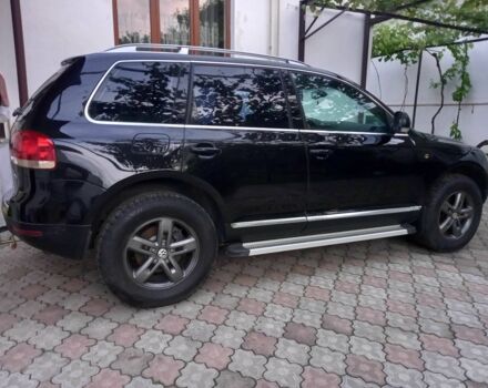 Черный Фольксваген Туарег, объемом двигателя 3.2 л и пробегом 204 тыс. км за 8100 $, фото 1 на Automoto.ua