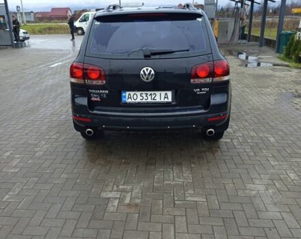 Черный Фольксваген Туарег, объемом двигателя 3 л и пробегом 237 тыс. км за 14300 $, фото 1 на Automoto.ua