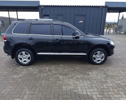 Черный Фольксваген Туарег, объемом двигателя 3 л и пробегом 237 тыс. км за 14300 $, фото 2 на Automoto.ua