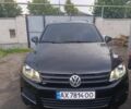 Черный Фольксваген Туарег, объемом двигателя 3 л и пробегом 400 тыс. км за 15300 $, фото 1 на Automoto.ua