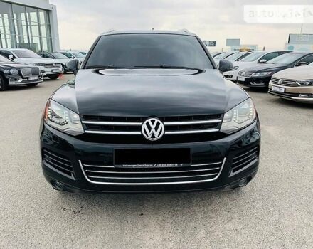 Черный Фольксваген Туарег, объемом двигателя 3 л и пробегом 264 тыс. км за 18500 $, фото 1 на Automoto.ua