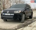 Черный Фольксваген Туарег, объемом двигателя 3 л и пробегом 264 тыс. км за 18500 $, фото 1 на Automoto.ua