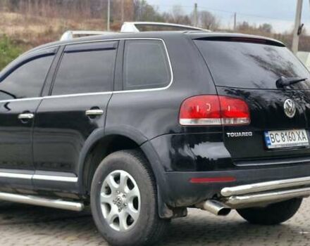 Черный Фольксваген Туарег, объемом двигателя 3.2 л и пробегом 237 тыс. км за 7500 $, фото 2 на Automoto.ua