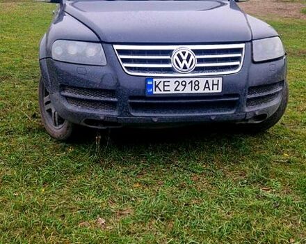 Черный Фольксваген Туарег, объемом двигателя 3.2 л и пробегом 204 тыс. км за 7400 $, фото 1 на Automoto.ua