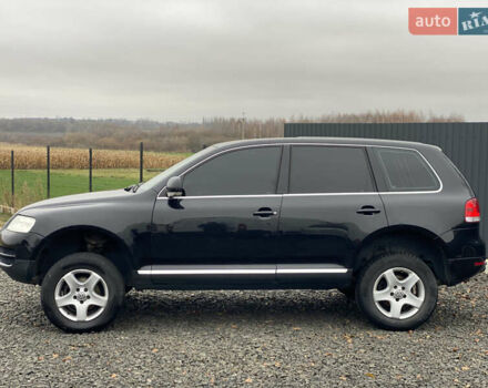 Черный Фольксваген Туарег, объемом двигателя 2.5 л и пробегом 373 тыс. км за 6950 $, фото 77 на Automoto.ua